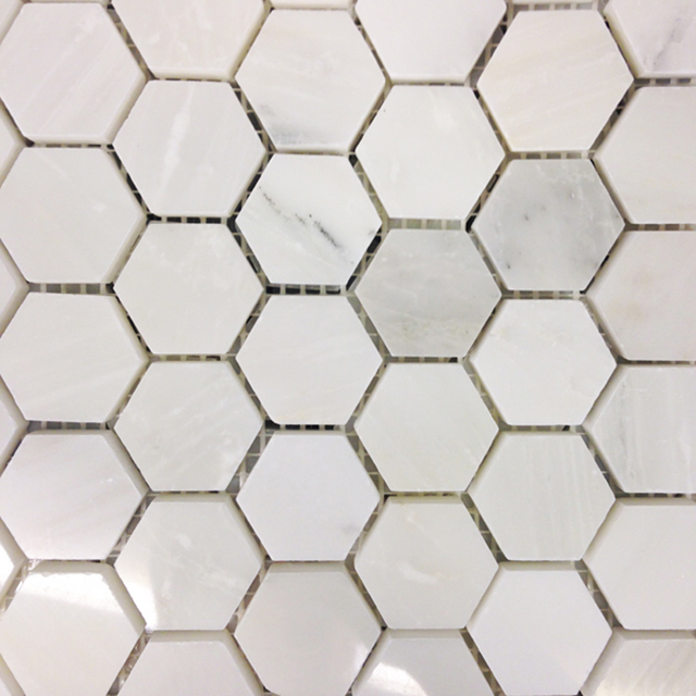 white marble hex tiles